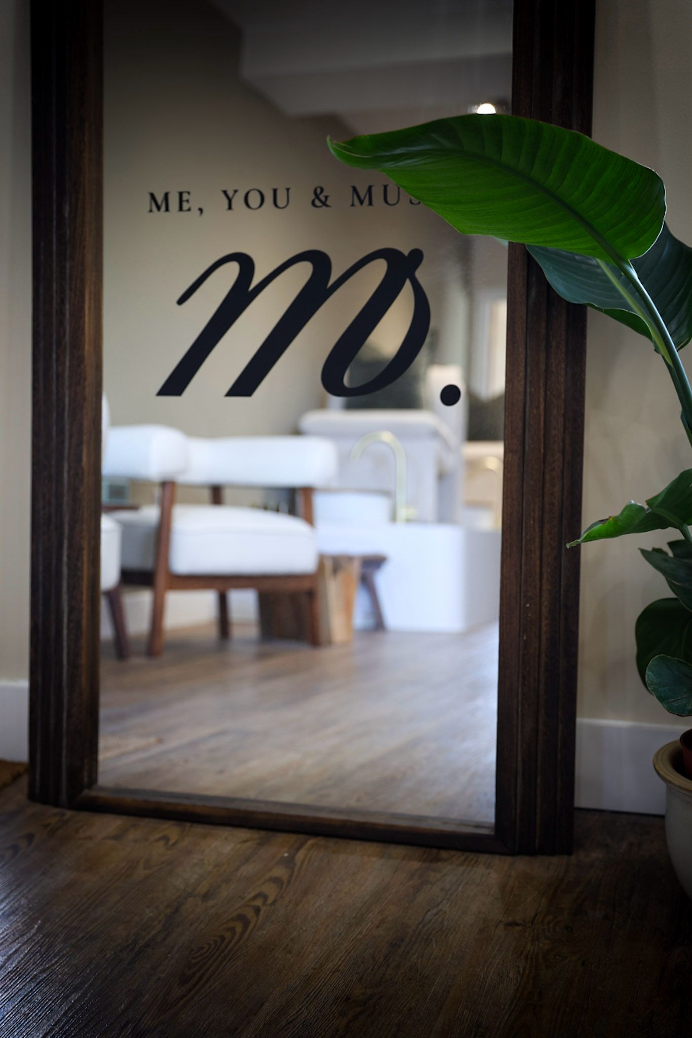 Muse Studio mirror with branding